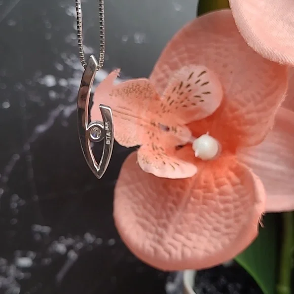 14KT WHITE GOLD TENSION SET DIAMOND PENDANT - Picture 5 of 13